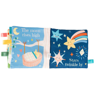 Children's soft book with star and moon illustrations on a white background