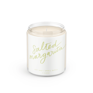 Candle in a glass jar with 'Salted Margarita' text on a white background