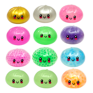 Set of colorful, smiley-faced balls in various colors on a white background