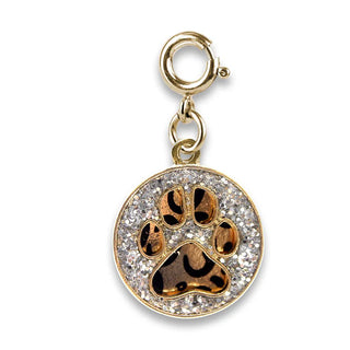 Gold charm with paw print design on a white background