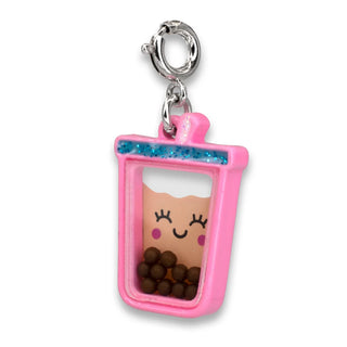 Pink pet treat container charm with a smiling face on a white background