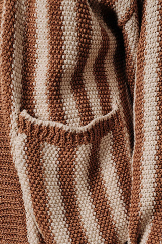 Close-up of a brown and beige striped fabric texture