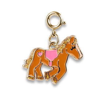 Gold horse charm with pink saddle on a white background