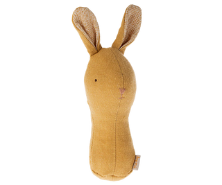 Yellow plush bunny toy with checkered ears on a white background