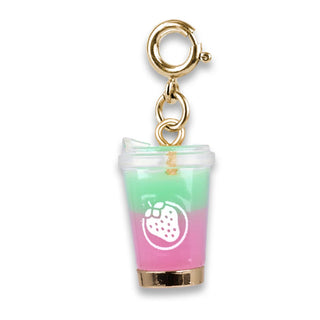 A miniature keychain charm shaped like a two-toned strawberry drink in a clear plastic cup, featuring a gold clasp at the top, with pink and green layers and a white strawberry graphic.