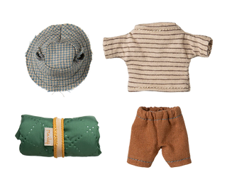 Set of miniature clothing items including a hat, shirt, pants, and a folded green fabric on a white background.