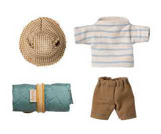 Set of miniature clothing items including a hat, sweater, pants, and blanket on a white background