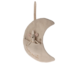 Decorative moon-shaped pillow with a plush mouse toy on a white background