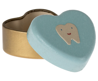 Heart-shaped tin with a gold interior and light blue lid featuring a tooth design on a white background