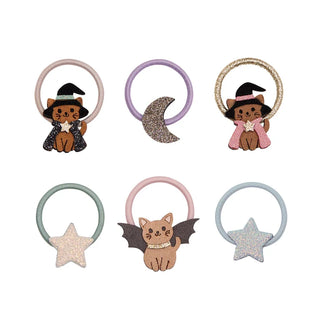 Set of six decorative hair ties with cat and bat designs on a white background