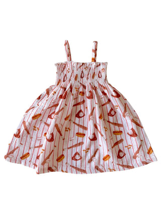 Dress with red and orange pattern on a white background
