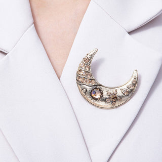 Decorative brooch on a white blazer