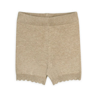 Beige knitted shorts on a white background