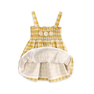 Yellow checkered dress with white flowers on a white background