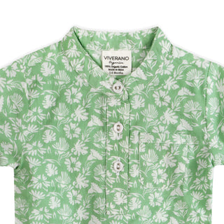 Green shirt with white floral pattern and 'Viverano' label on a white background