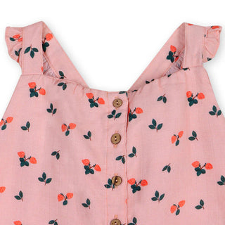 Pink dress with floral pattern and button details on a white background