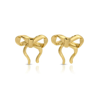 Gold bow-shaped earrings on a white background