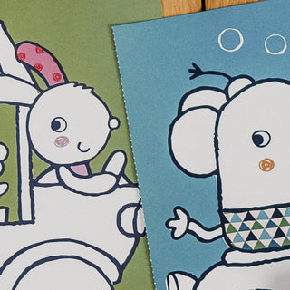 Two cartoon characters on fabric with a green and blue background