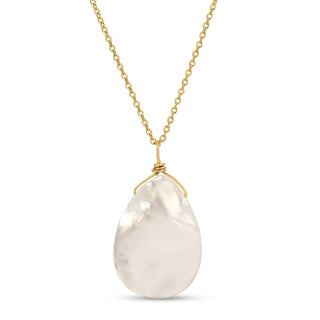 Necklace with a teardrop-shaped white pendant on a gold chain against a white background