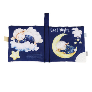 Children's book with a blue cover featuring a sheep, moon, and stars, titled 'Good Night'.