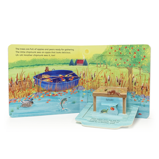 Children's book with a colorful illustration of a pond and trees on a white background