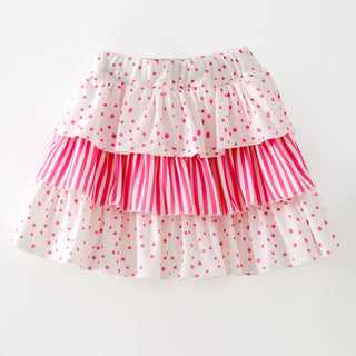 Polka dot and striped skirt on a white background