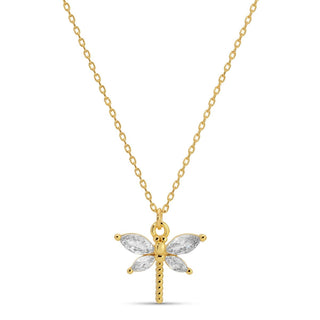Gold dragonfly pendant necklace on a white background