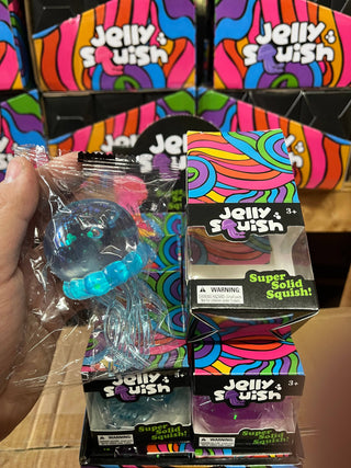 Jelly Squish toy packaging with colorful design and warning label.