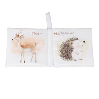 Children's book with illustrations of a deer and a hedgehog on white pages.