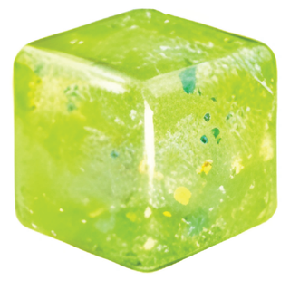 Green cube with speckles on a white background