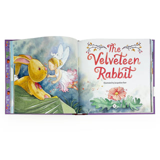 Open book showing 'The Velveteen Rabbit' with a fairy and teddy bear illustration on a white background.