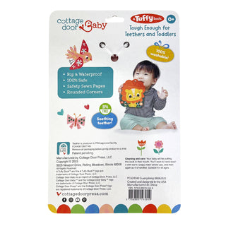 Package of Tuffy the Lion toy for babies with a child holding the toy on a white background
