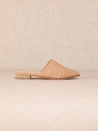 Beige woven slip-on shoe on a beige background