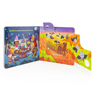 Halloween-themed children's book with colorful illustrations on a white background