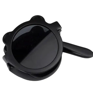 Black plastic children's sunglasses on a white background