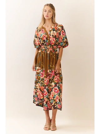 Woman wearing a floral dress on a beige background