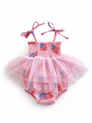 Pink baby romper with American flag design on a white background