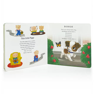 Children's book open to two pages with illustrations and text, featuring a dog named Bingo.