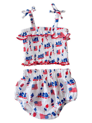 Two-piece baby outfit with American flag pattern on a white background