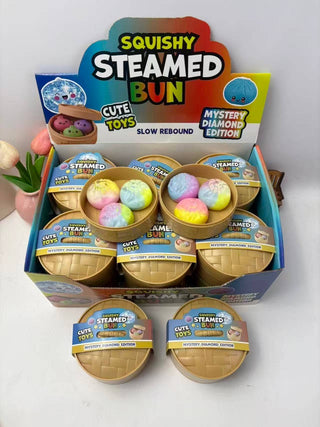 Box of Squishy Steamed Bun toys with colorful contents on a white background