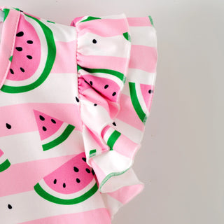 Fabric with watermelon pattern on a plain background
