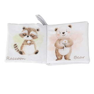 Children's soft book with illustrations of a raccoon and a bear on white pages.