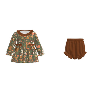A two-piece toddler girl's outfit set featuring a long-sleeve dress with a woodland forest print in sage green and brown, paired with matching brown ruffled bloomers, shown on a plain white background.