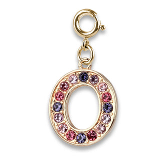 Gold charm with colorful crystals on a white background