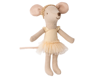 Stuffed mouse toy in a ballerina outfit on a white background