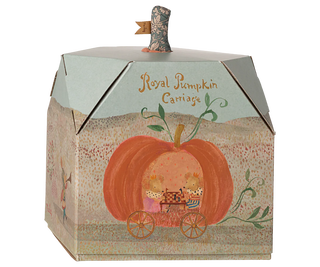Decorative pumpkin-shaped box with a carriage design on a white background