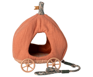 Pumpkin-shaped pet bed with wheels and a handle on a white background