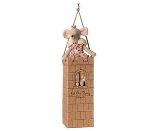 Wooden toy castle with a teddy bear and mouse on top, hanging from a rope.