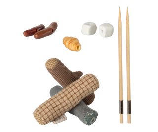 Knitting needles and yarn on a white background