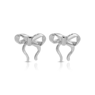 Silver bow-shaped earrings on a white background